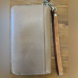 Dooney and Bourke wallet.  Tan with hot pink interior.